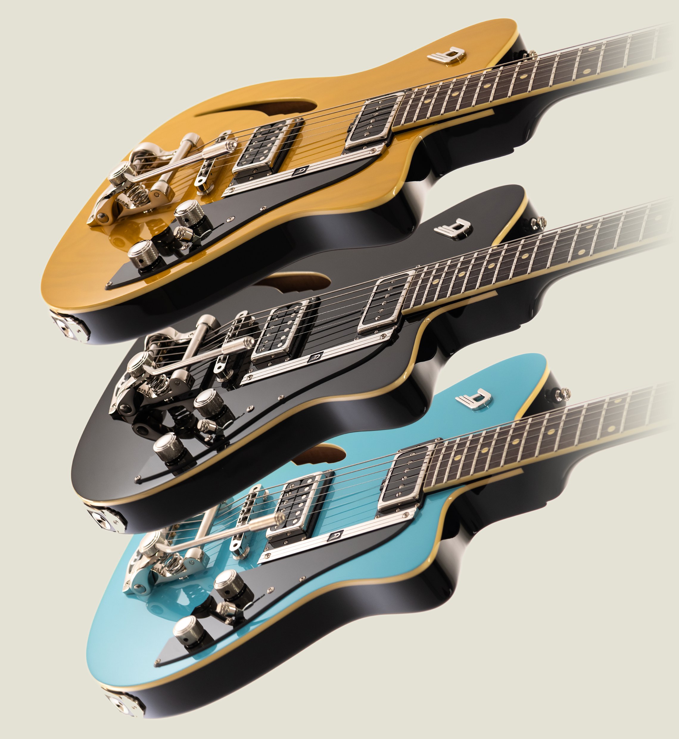 Foto of the three Duesenberg Caribou Models in Butterscotch, Black and Narvic Blue